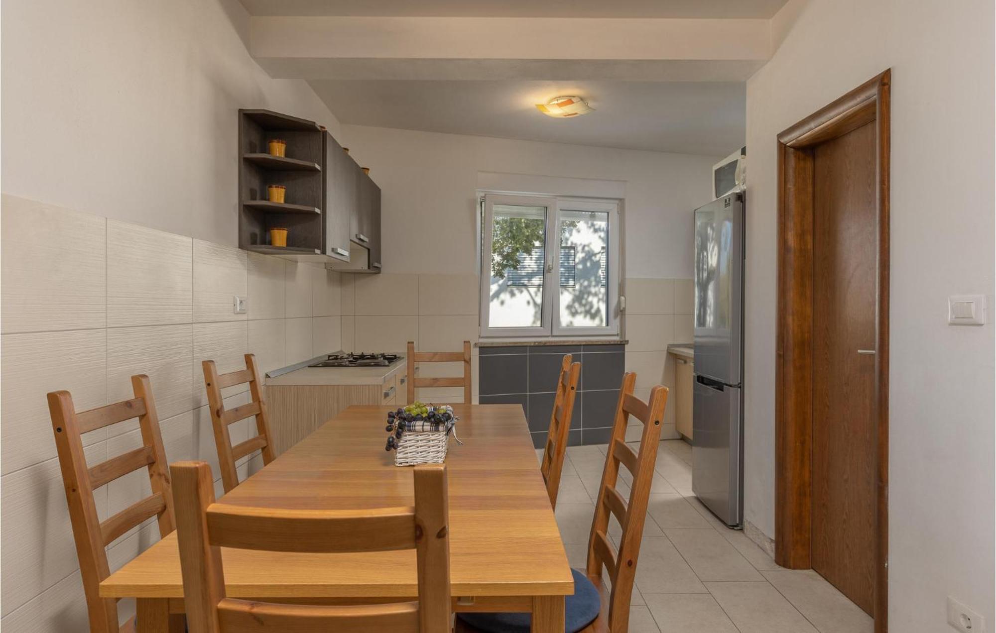 Amazing Apartment In Njivice With Kitchen Exterior photo